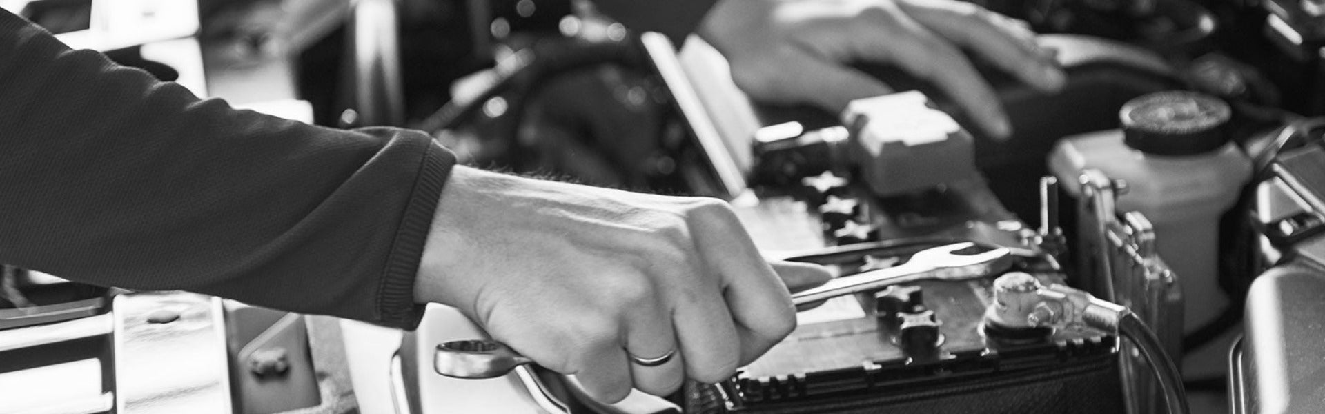 Service Technician Servicing The Car